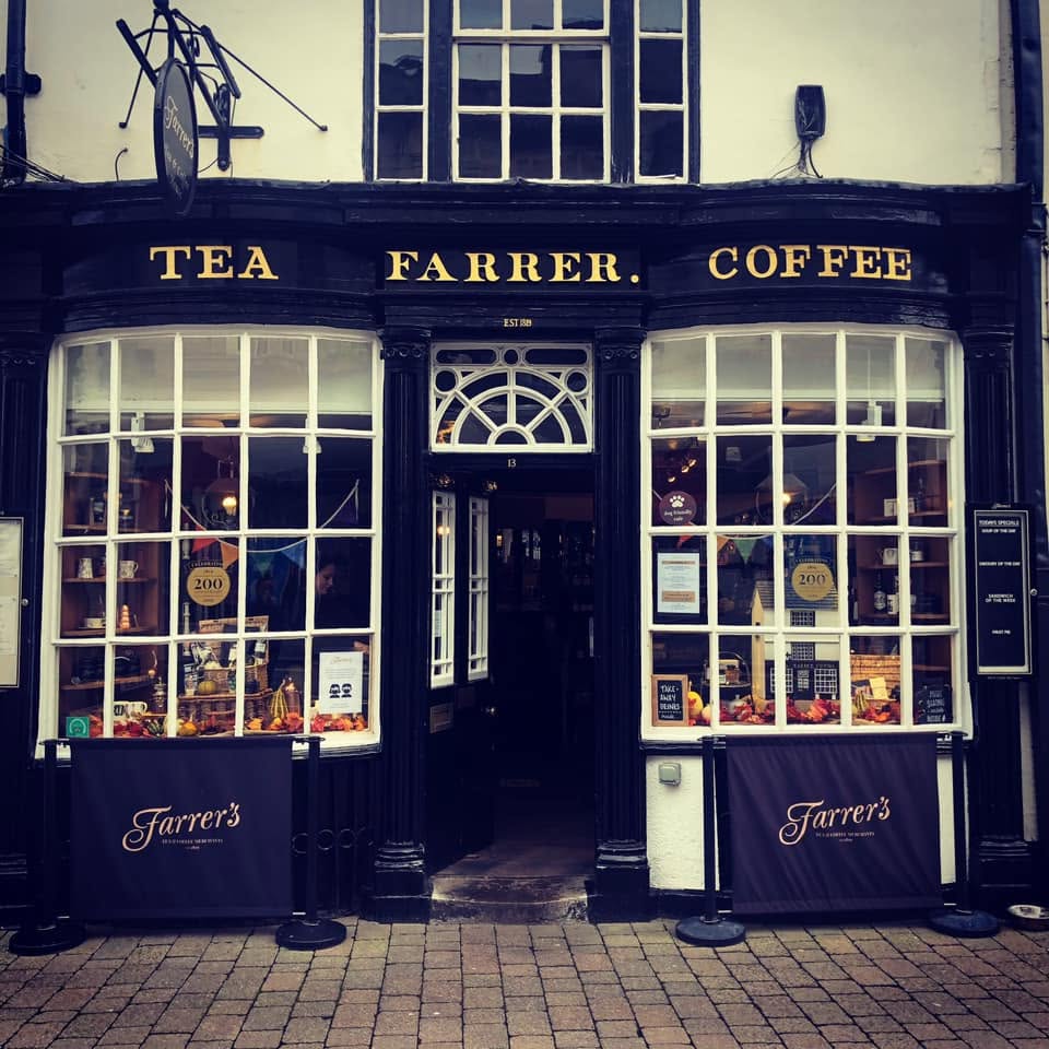 Farrer's of Kendal shopfront showing the black and gold fascia